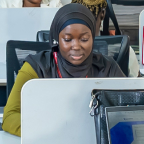 A female Rite Foods staff working at her desk